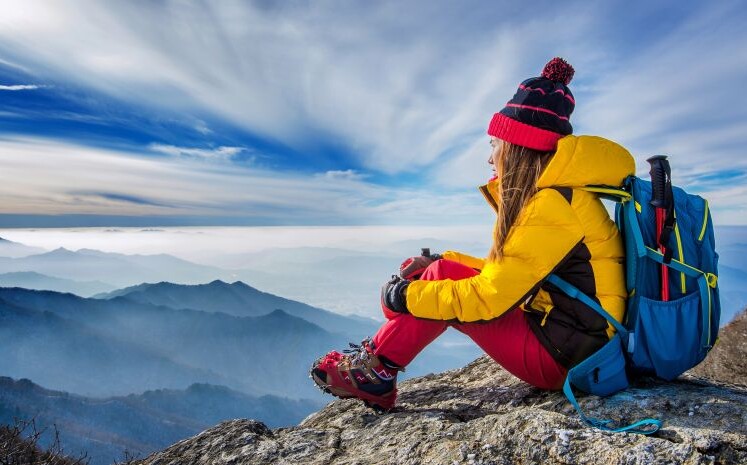young-woman-sitting-hill-high-mountains-1-